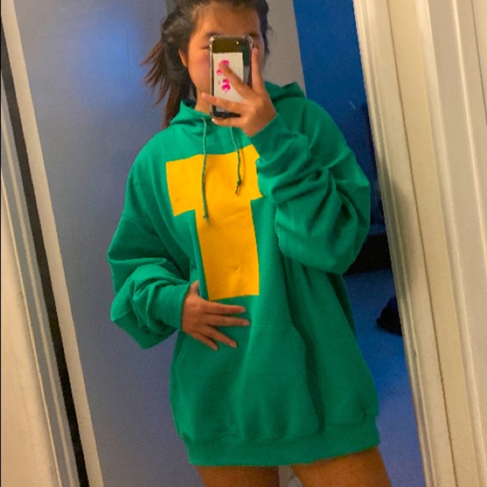 Green hoodie with letter T